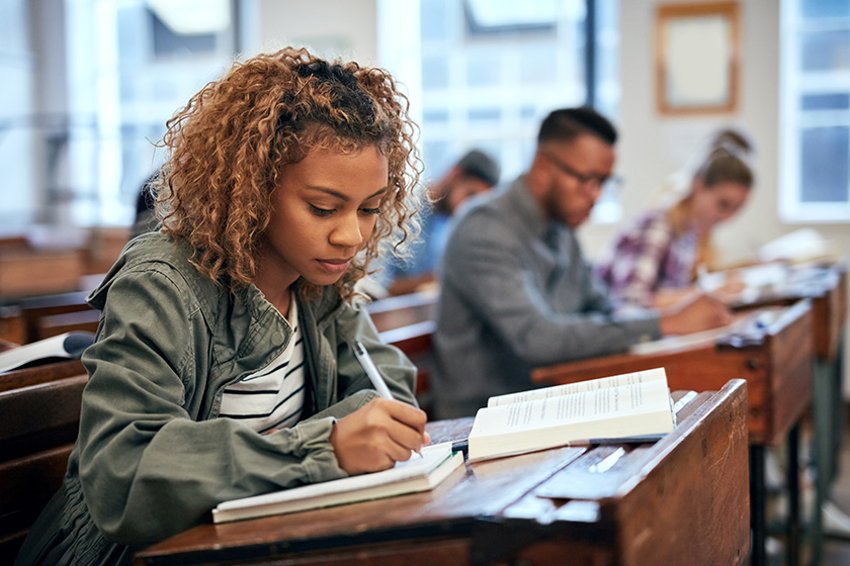 871569792 Cropped shot of university students sitting in class